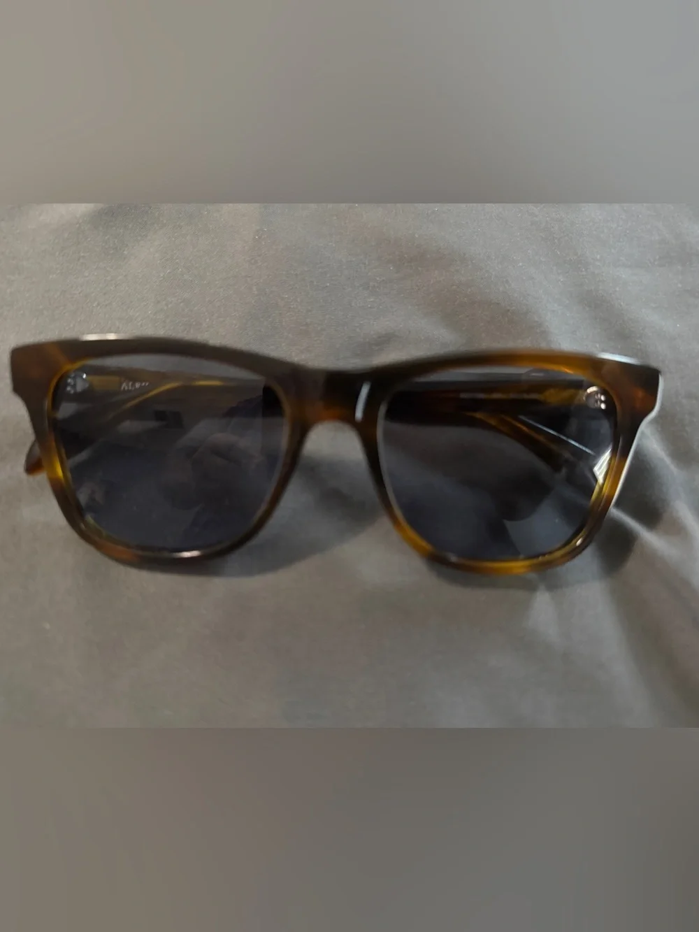 Alexander McQueen AM0158S is a unisex square-rectangle acetate sunglass
